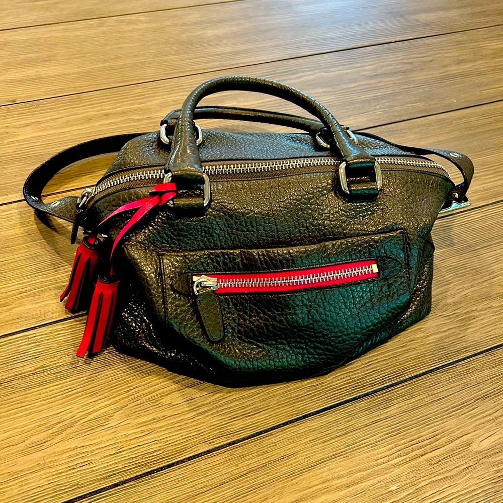 Coach bag: Gray with pink detailing.